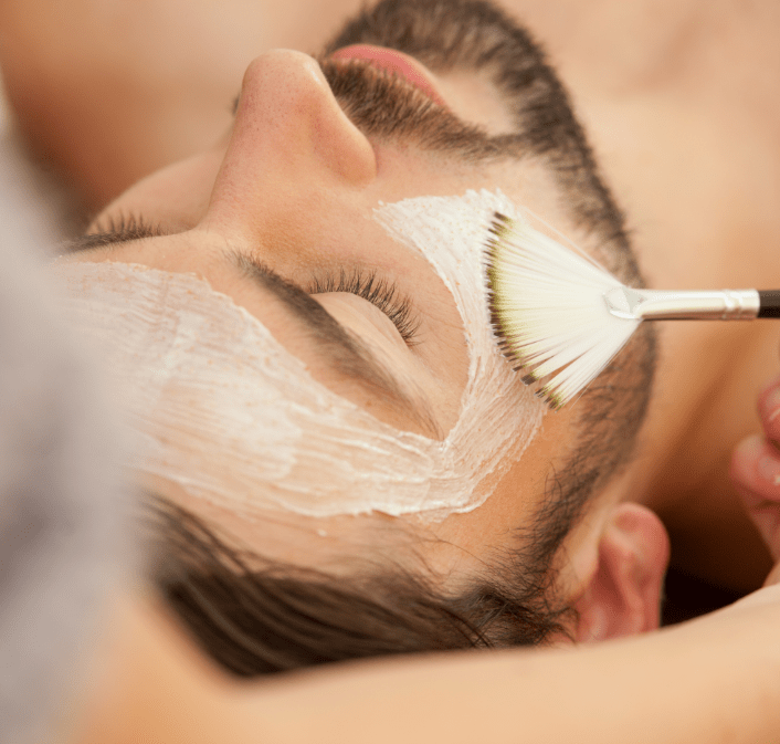 A Man getting facials treatment on face | Avail Aesthetics in Cary, Raleigh & Wake Forest, NC