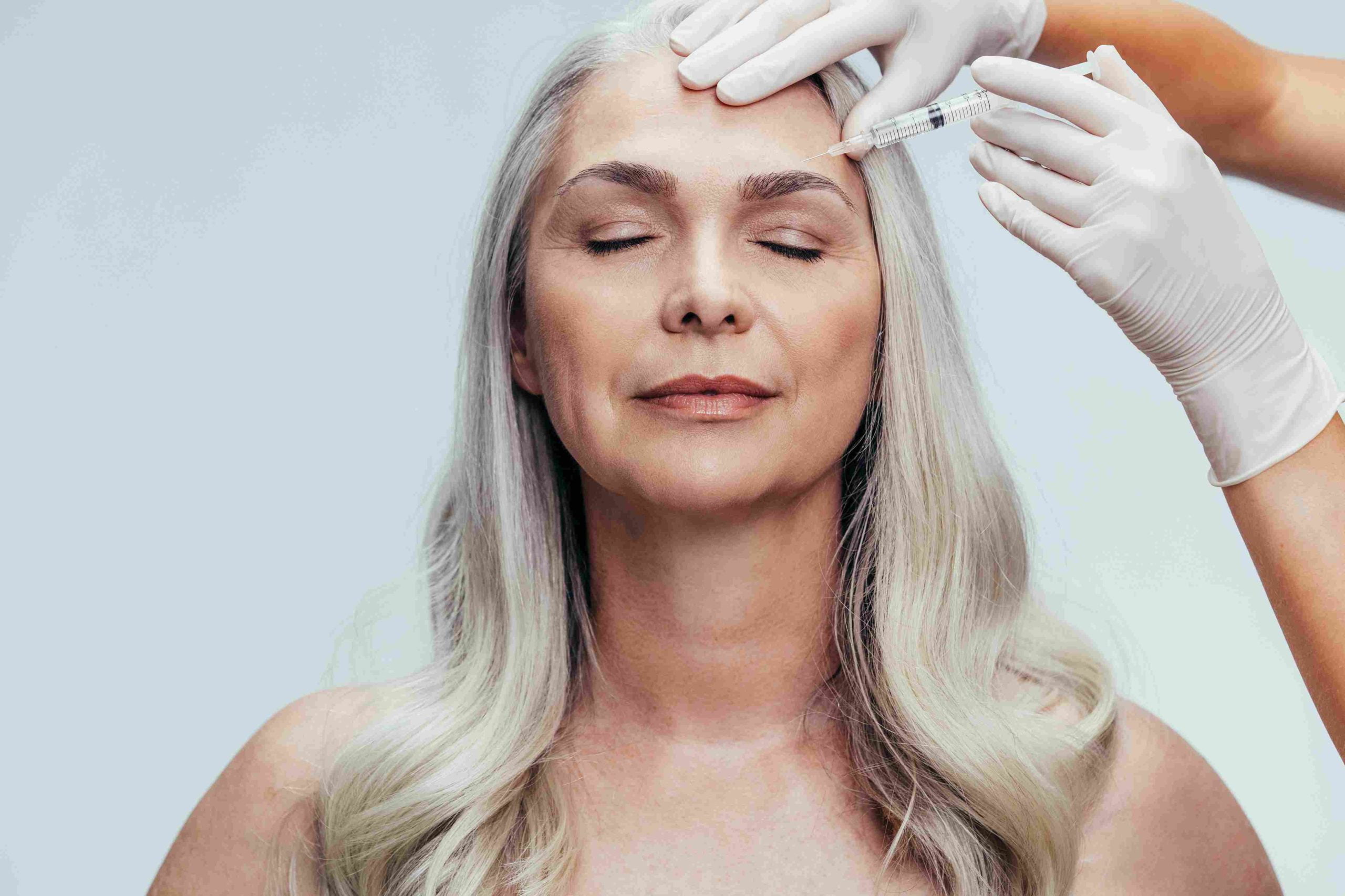 A woman getting injection on forehead | Belotero Balance | Avail Aesthetics in Cary, Raleigh & Wake Forest, NC