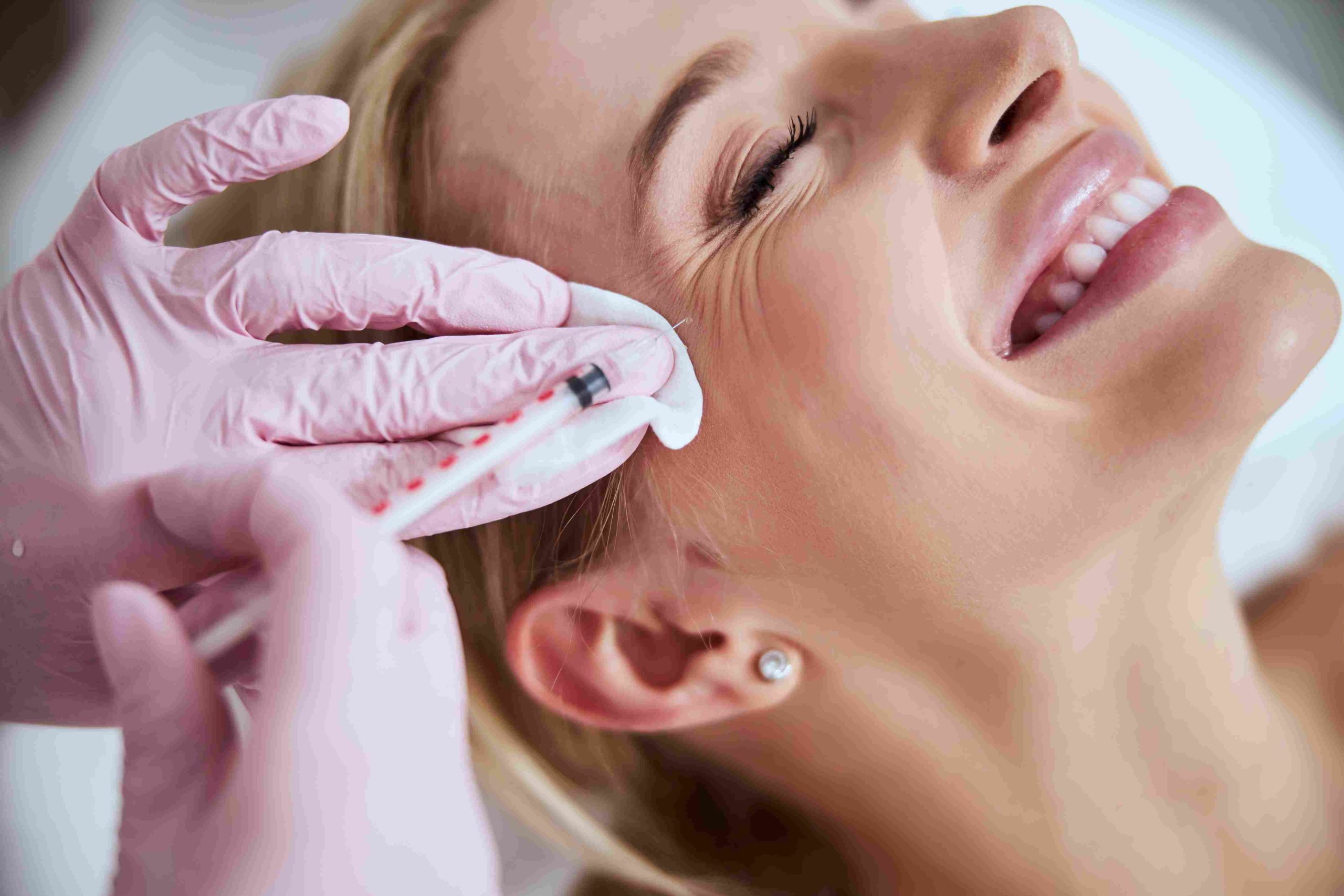 Portrait of a woman getting treatment for lines on near eyes | Dysport | Avail Aesthetics in Cary, Raleigh & Wake Forest, NC