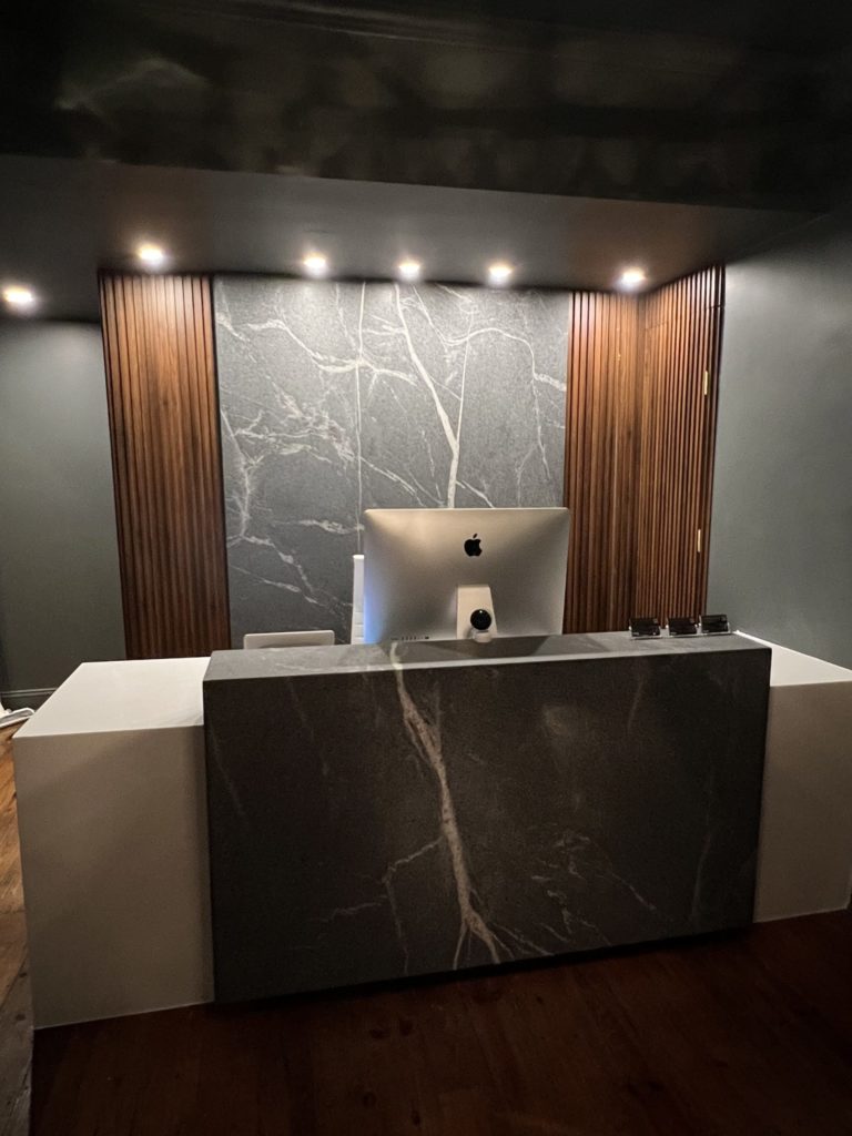 Dubai Office Reception Desk | Avail Aesthetics in Cary, Raleigh & Wake Forest, NC