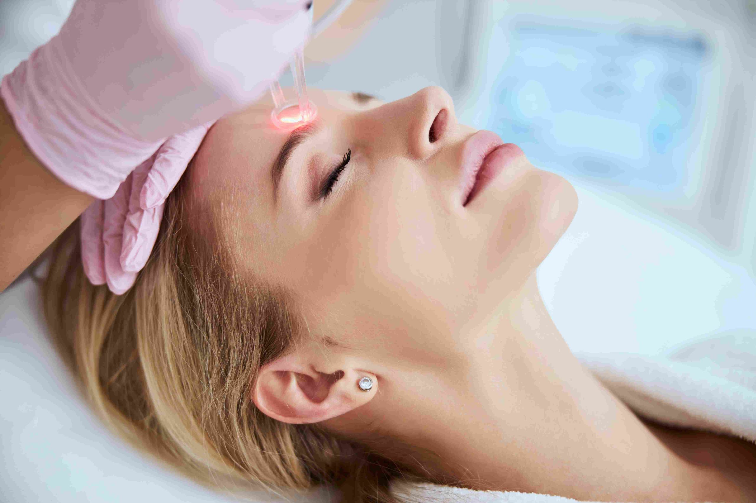 A Woman getting laser treatment | Juvederm | Avail Aesthetics in Cary, Raleigh & Wake Forest, NC