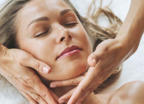 Woman getting facial care by beautician at spa salon | Avail Aesthetics in Cary, Raleigh & Wake Forest, NC